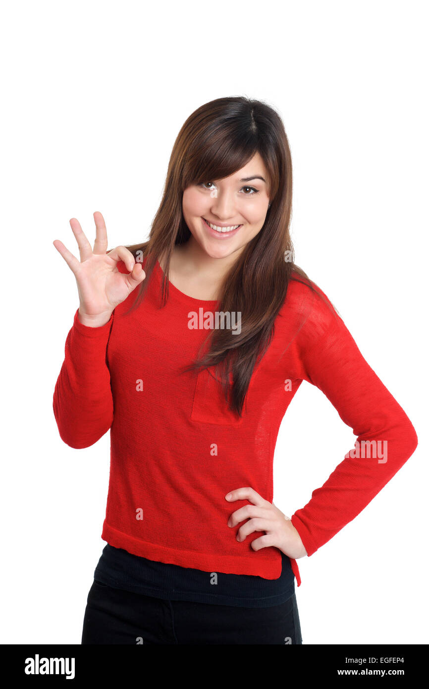 OK Hand Zeichen Frau in rot auf weißem Hintergrund Stockfoto