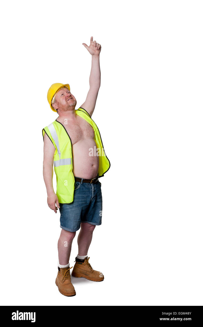 Arbeiter in Bauarbeiterhelm zeigend, isoliert auf weiss Stockfoto