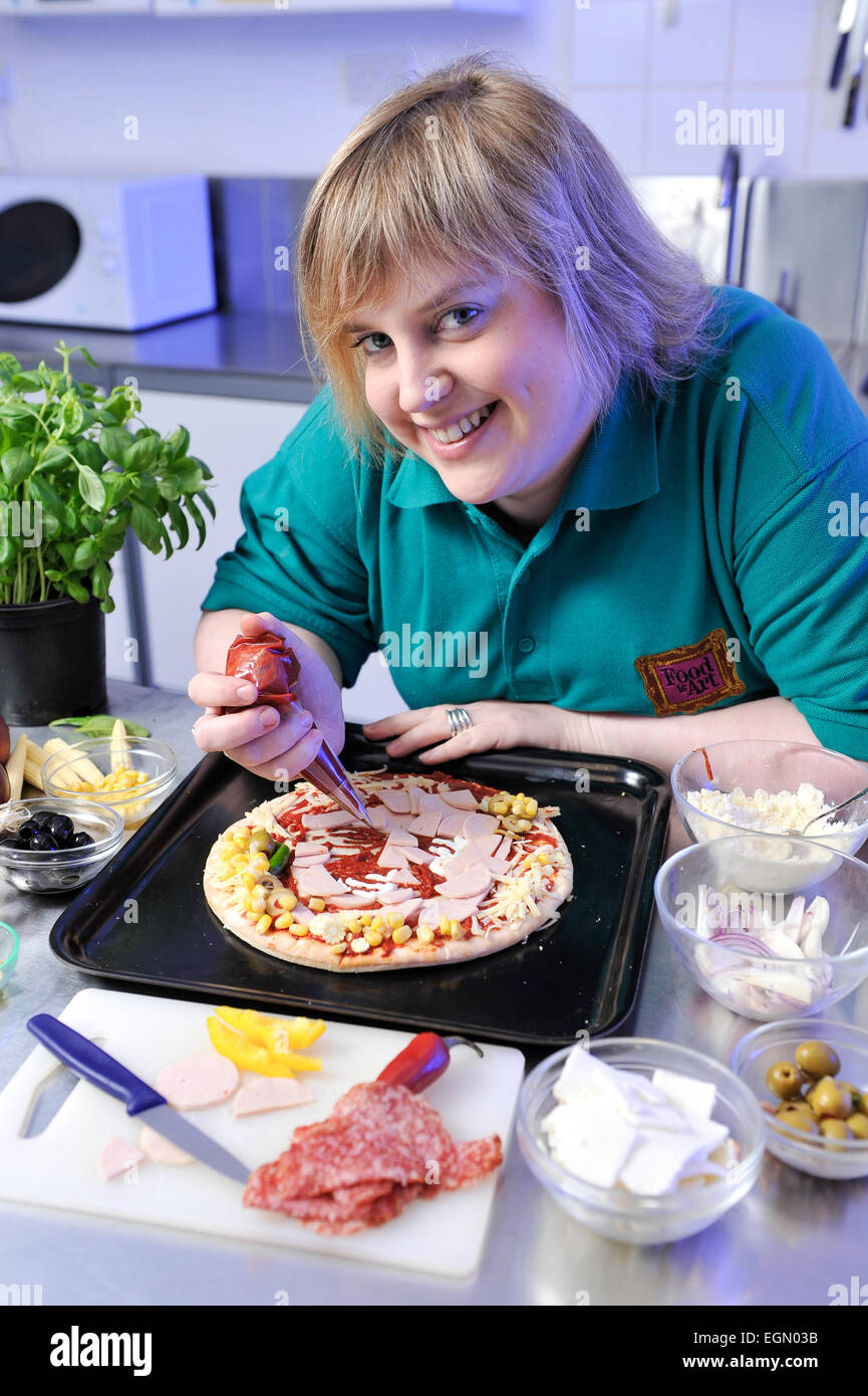Essen Künstler Prudence Staite schuf Pizzas von bekannten Gesichtern. Stockfoto