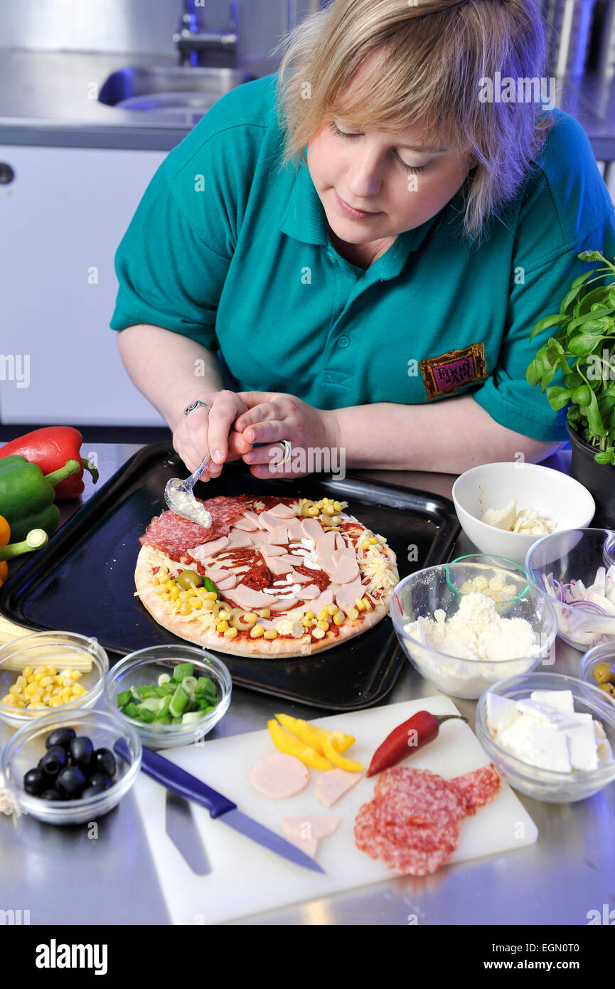 Essen Künstler Prudence Staite schuf Pizzas von bekannten Gesichtern. Stockfoto