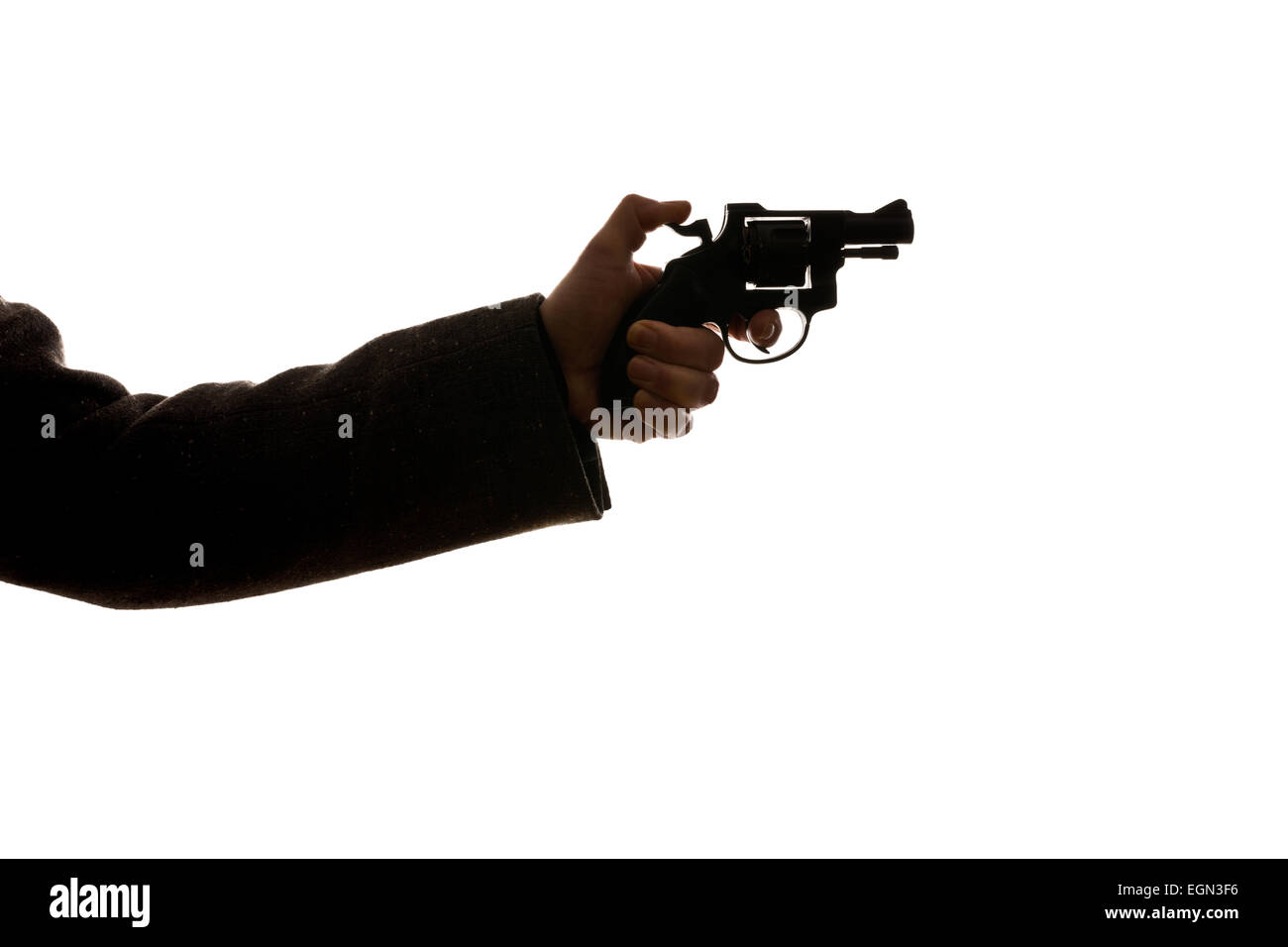 Mann eine Pistole auf dem weißen Hintergrund schießen Stockfoto