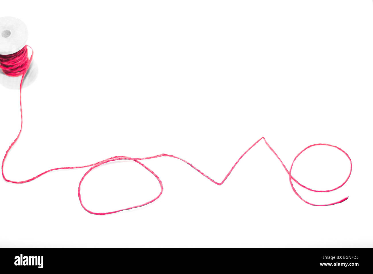Worte der Liebe Thread auf isoliert auf weißem Hintergrund Stockfoto