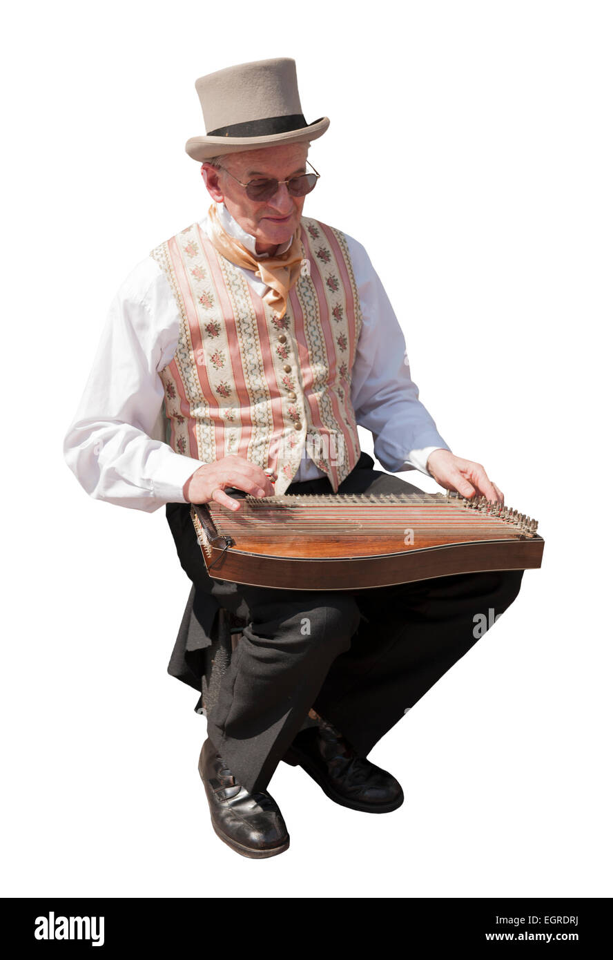Mann, der in der Viktorianischen dress Spielen zither Rochester Dickens Festival Stockfoto