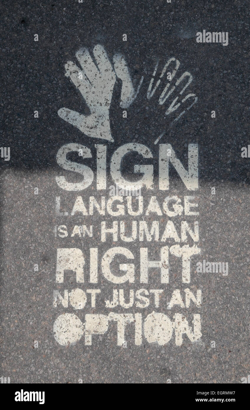 Melden Sie auf Bürgersteig bezüglich "Sign Language" in Brüssel, Belgien. Stockfoto