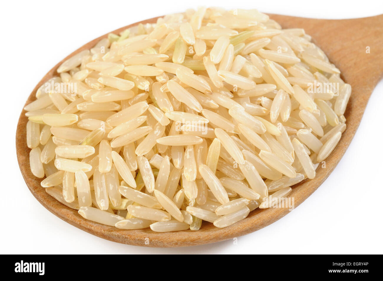 Brauner Reis in Holzlöffel Stockfoto