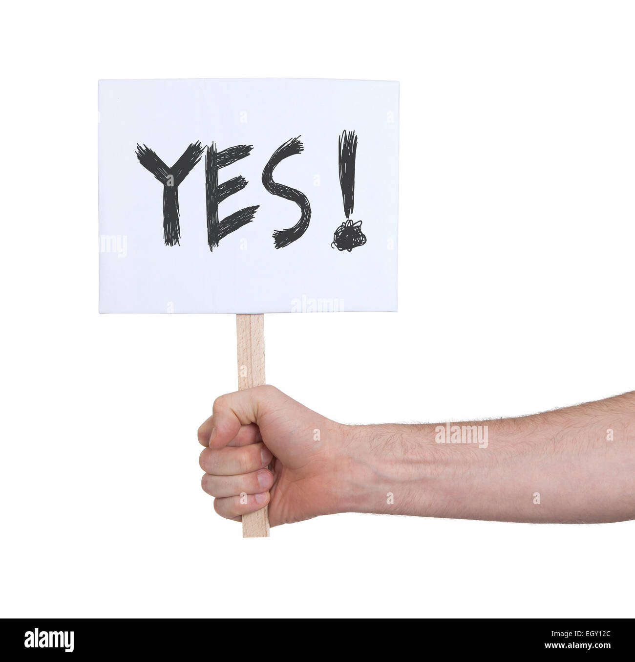 Hand mit Schild, isoliert auf weiss - ja Stockfoto