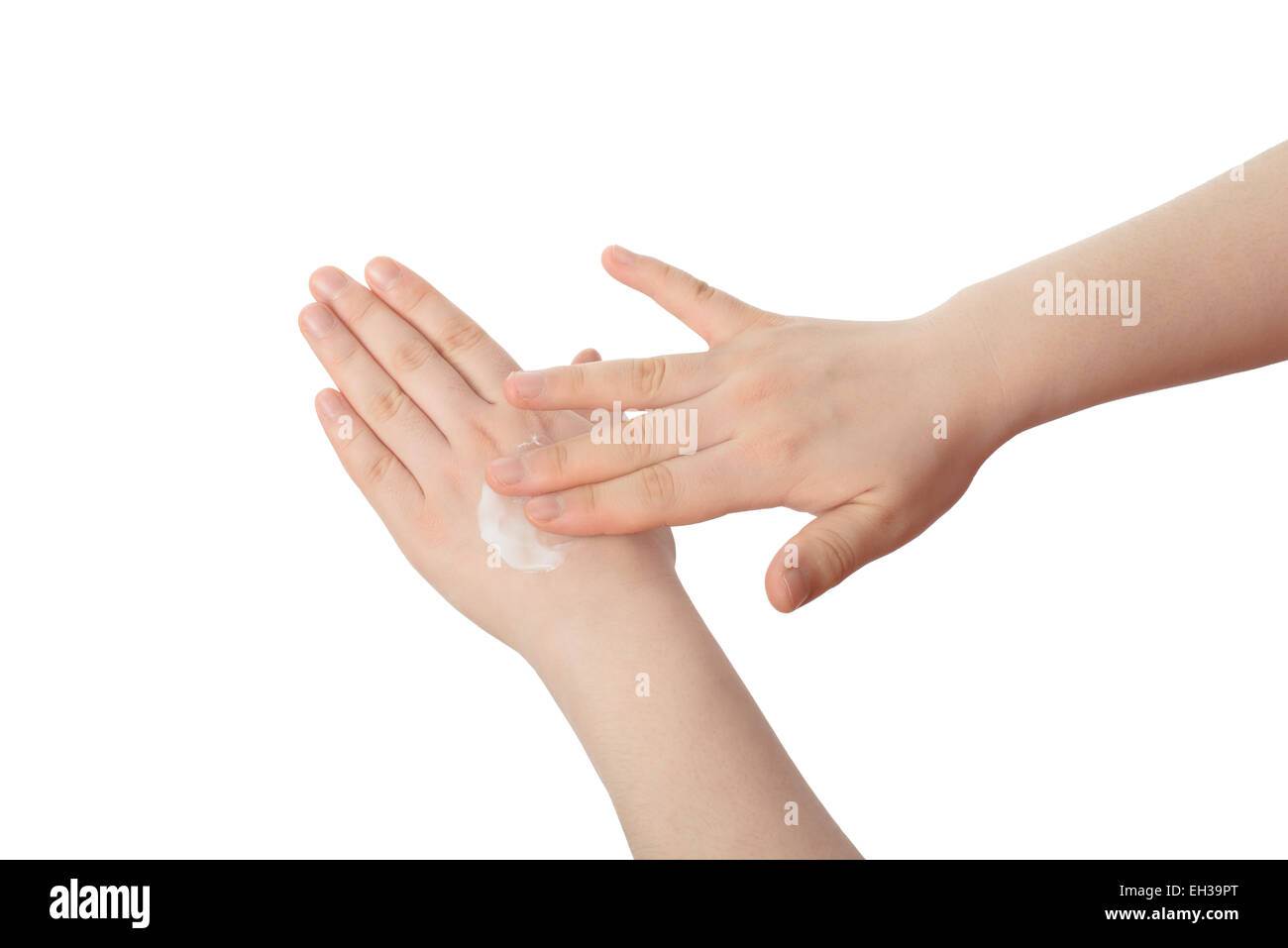 weiße Lotion auf der Hand, isoliert auf weiss Stockfoto