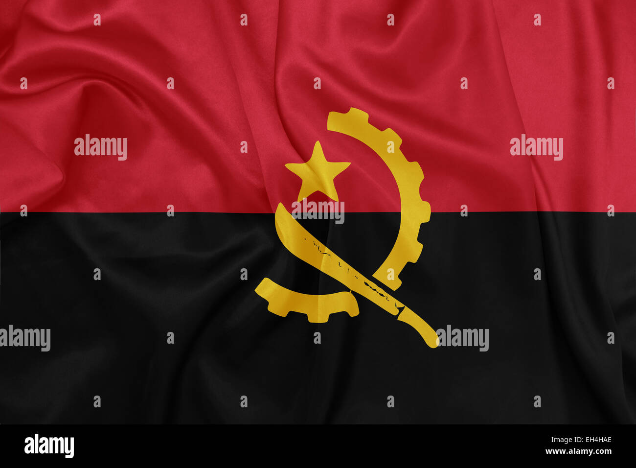 Angola - winken Nationalflagge auf Seide Textur Stockfoto