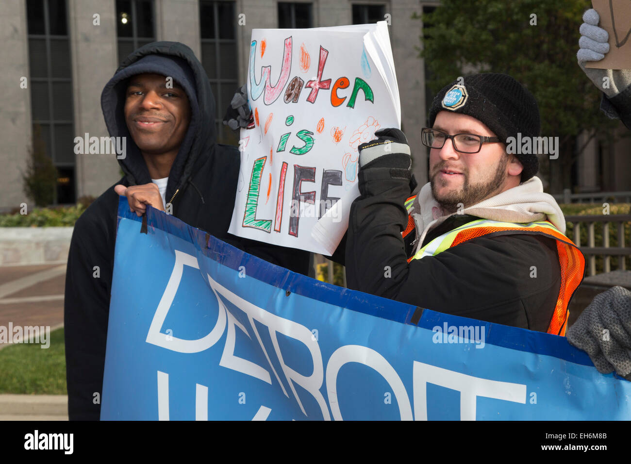 Detroit, Michigan - Mitglieder von Detroit Wasser Brigade Protest Wasser Absperrungen. Stockfoto