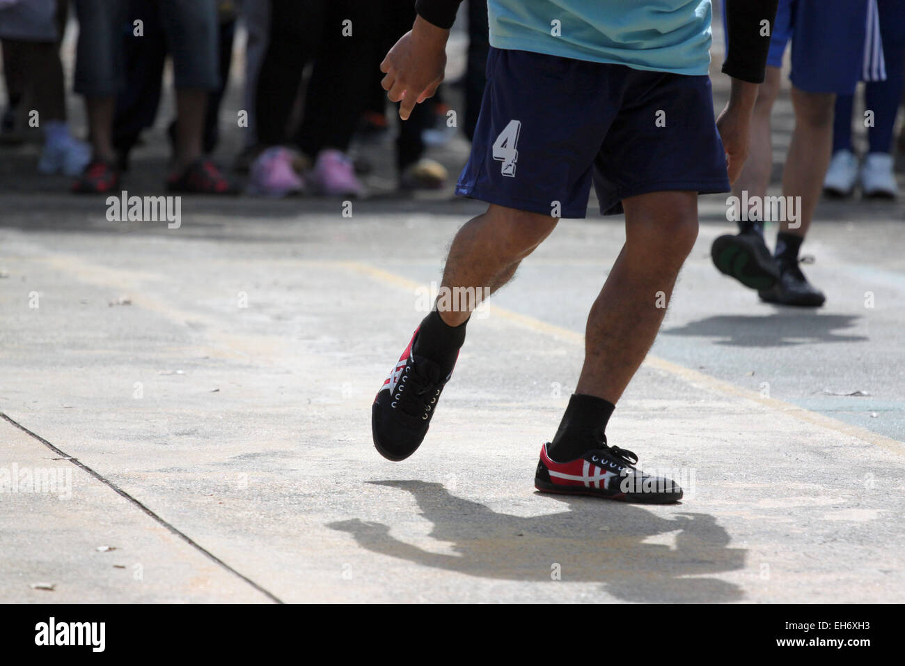 Sportler üben Beine für den Wettbewerb. Stockfoto