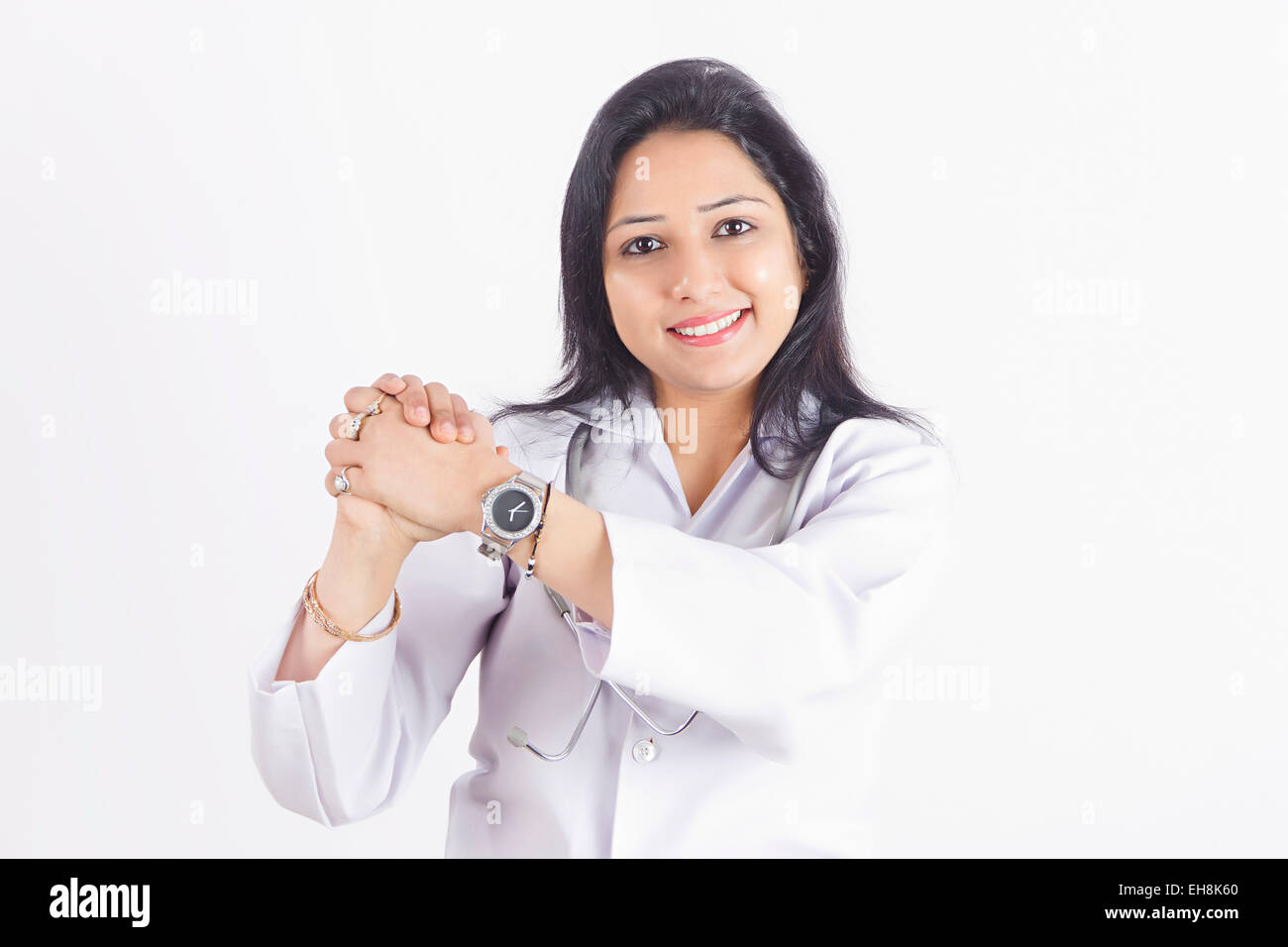 1 indische Erwachsene Frau Doktor Händen umklammert anzeigen Stockfoto