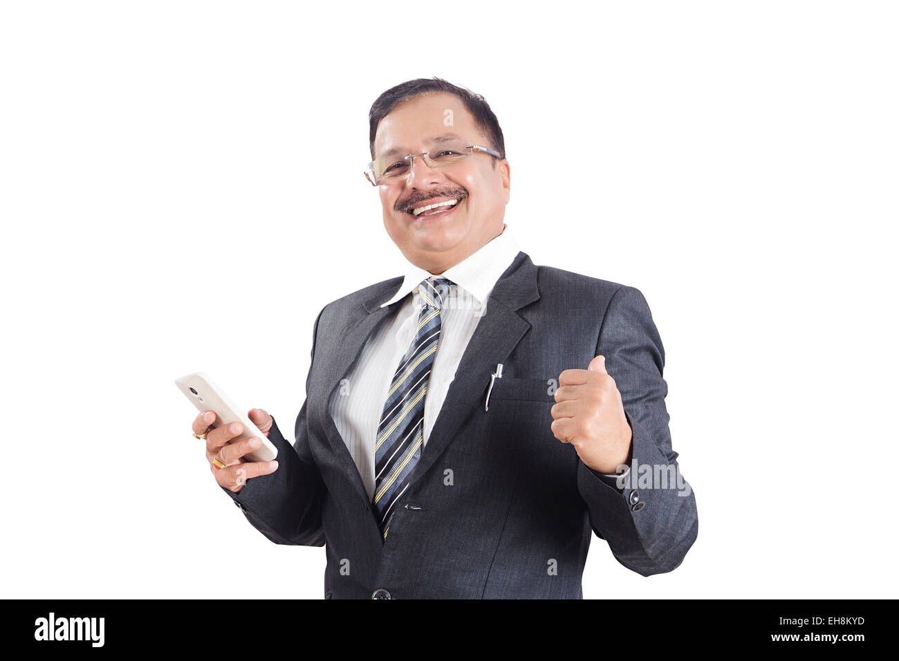 1 indische Business Mann Dialing Handy Stockfoto