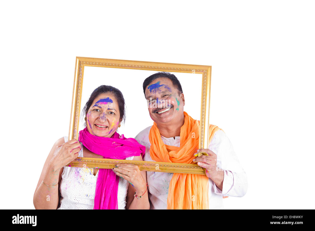 2 indische Senioren verheiratet Paare Holi Festival Bild Frame anzeigen Stockfoto