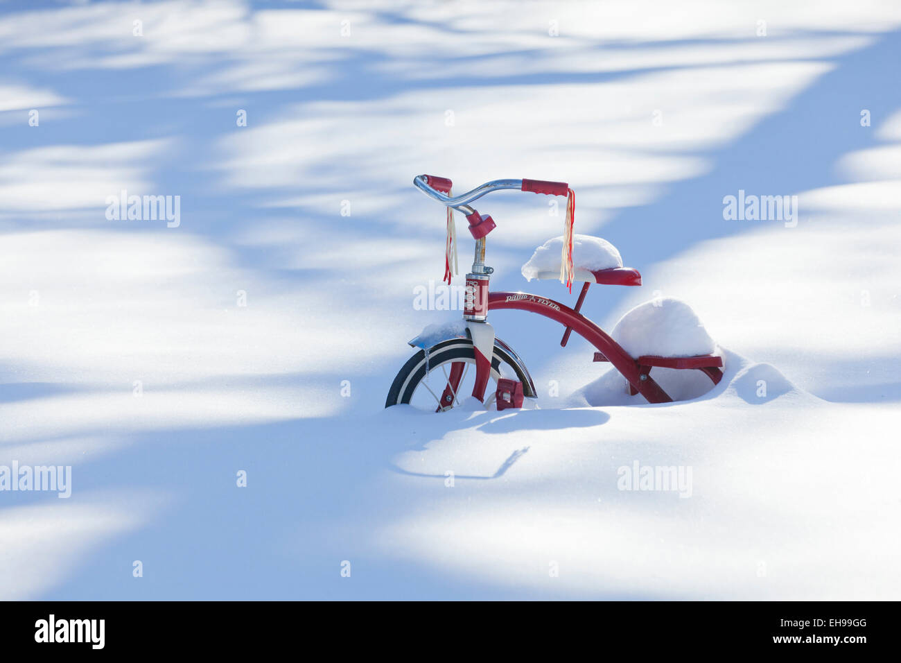 Schneebedeckte, Kinder Dreirad - USA Stockfoto