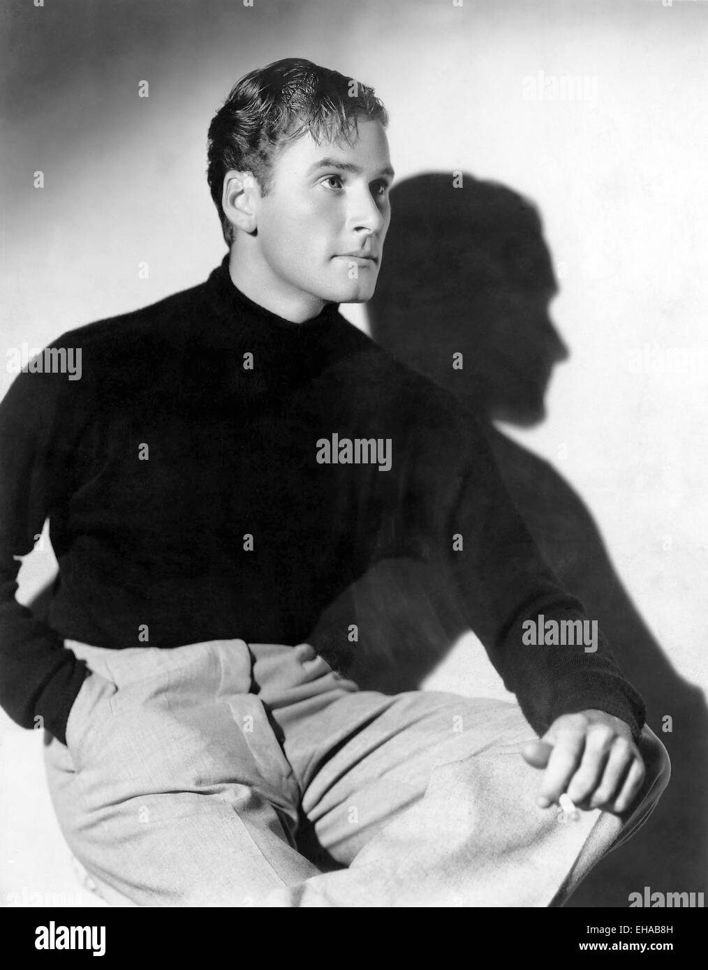 Errol Flynn, Porträt, um Mitte 1930 Stockfoto