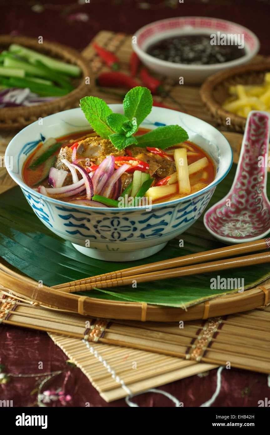 Assam Laksa. Scharfe Nudelsuppe Malaysia Food Stockfoto
