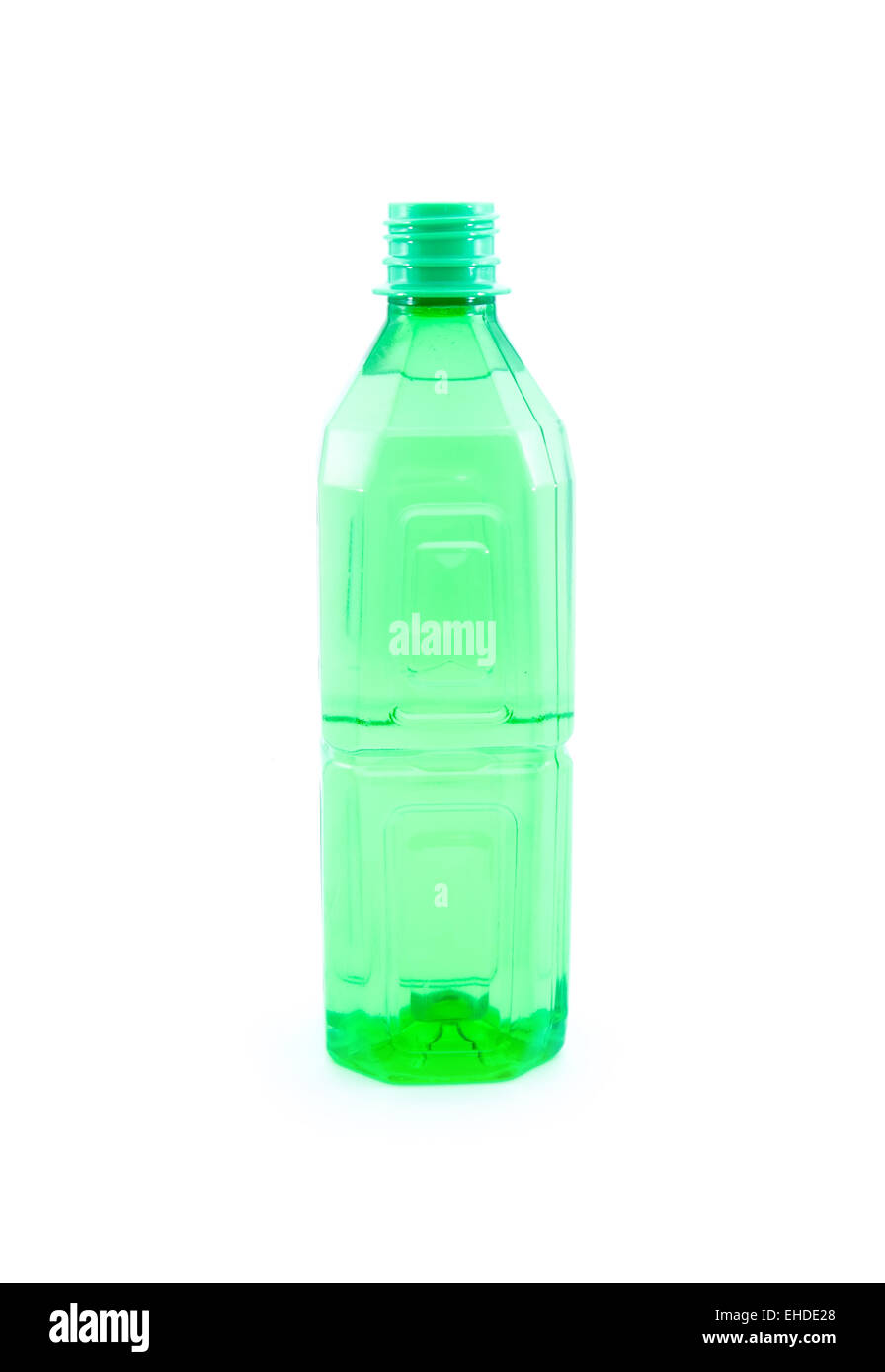 grüne durchsichtige Flasche isoliert auf weißem Hintergrund Stockfoto
