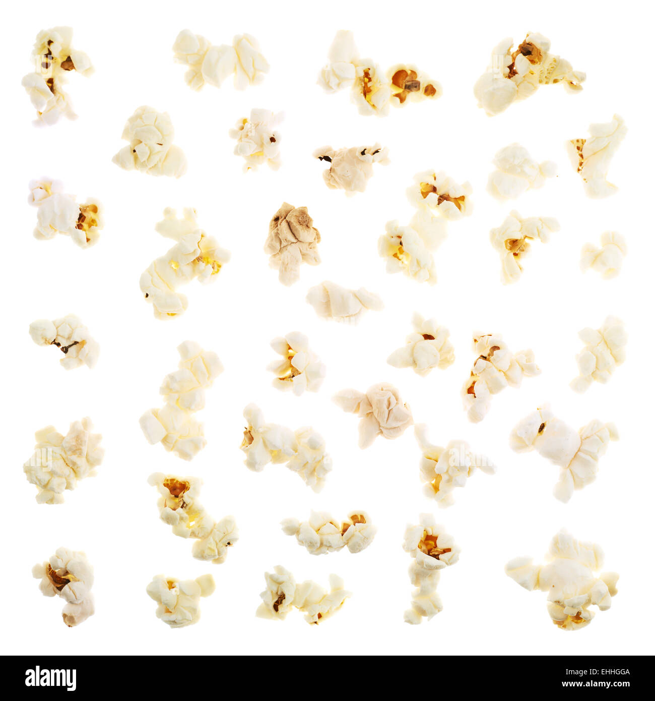 Einzigen Popcorn Stücke isoliert Stockfoto
