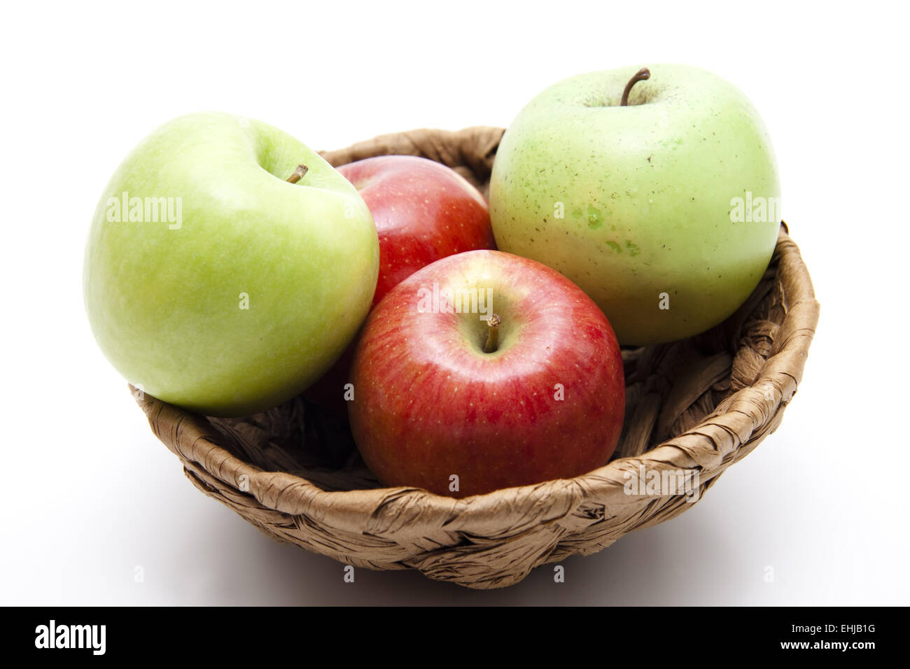 Äpfel im Korb Stockfoto