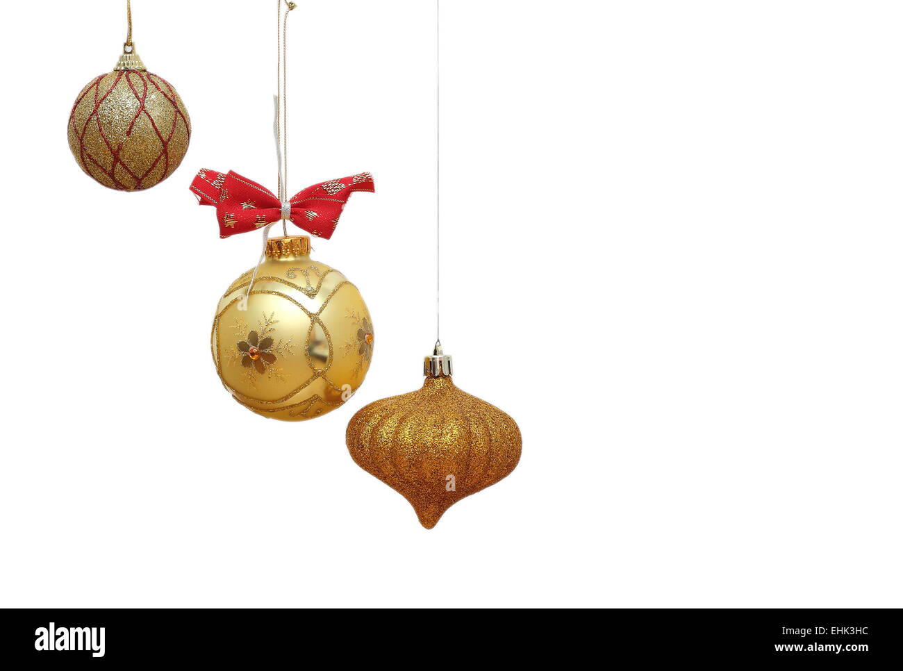 drei verschiedene schöne goldene Weihnachtskugeln Stockfoto