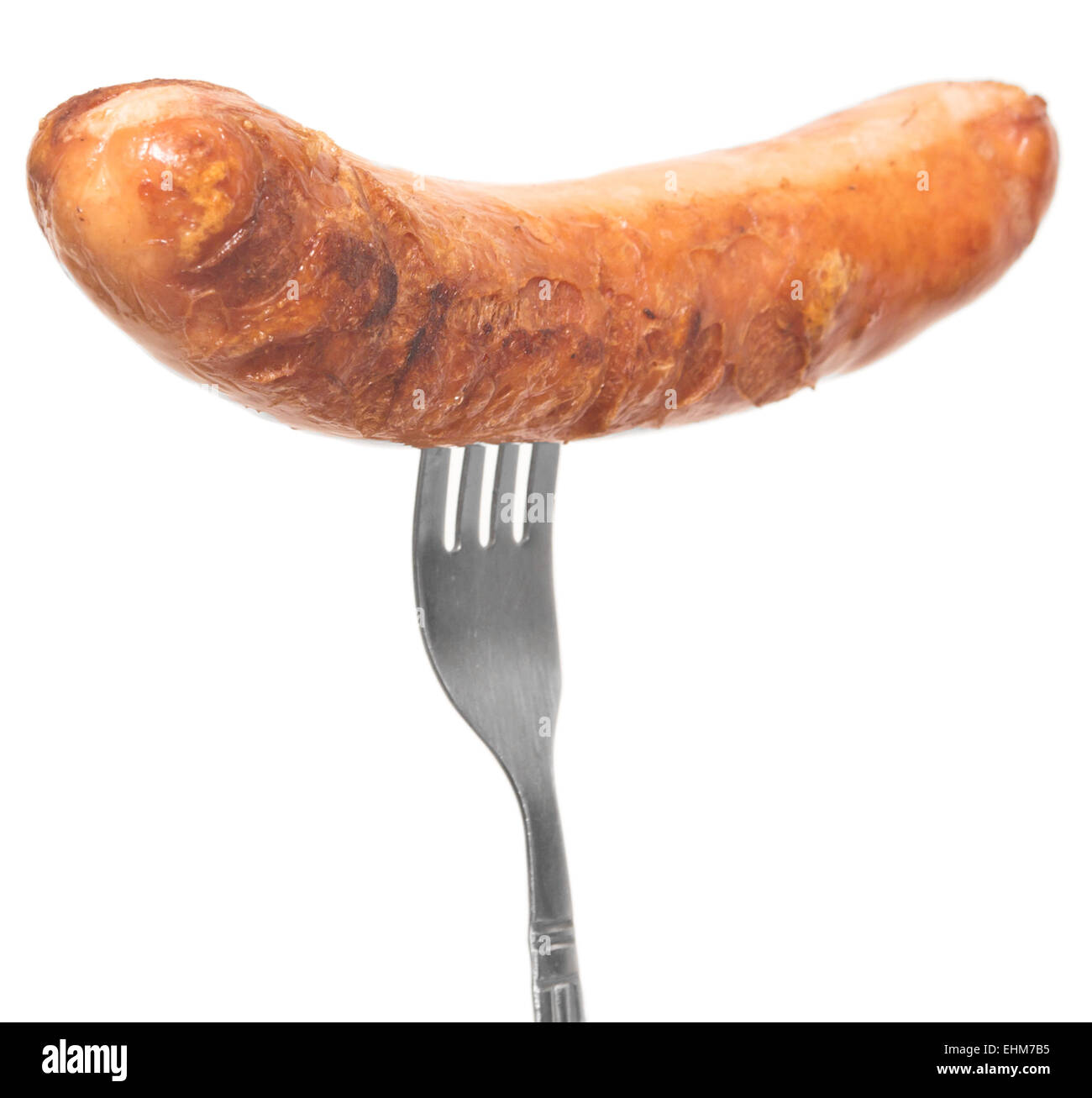 gegrillte Wurst auf einer Gabel isoliert auf weißem Hintergrund Stockfoto