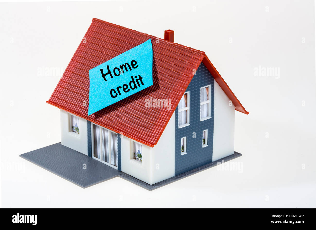 Symbolisches Bild, Haus mit Post-It Note, Haus Kredit Stockfoto