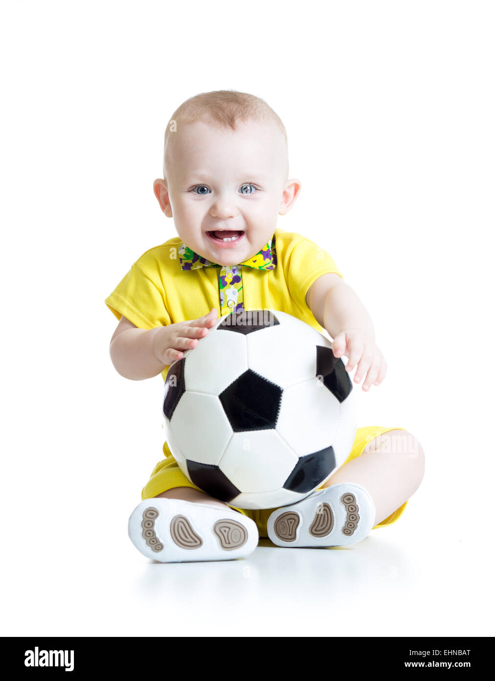 Kind Junge mit Fußball Stockfoto
