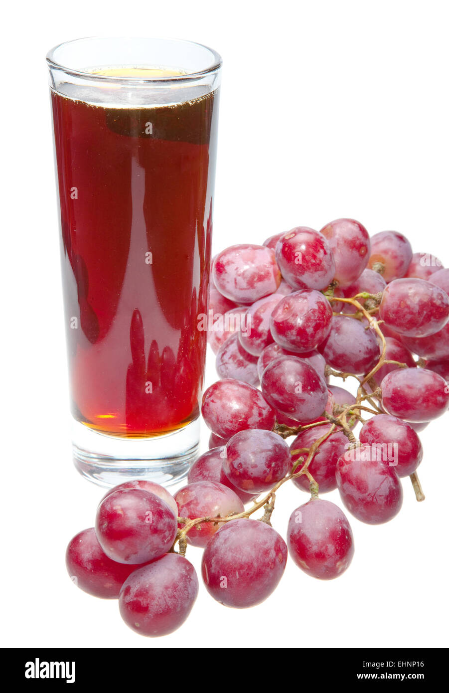 Traube und Saft im Glas Stockfoto