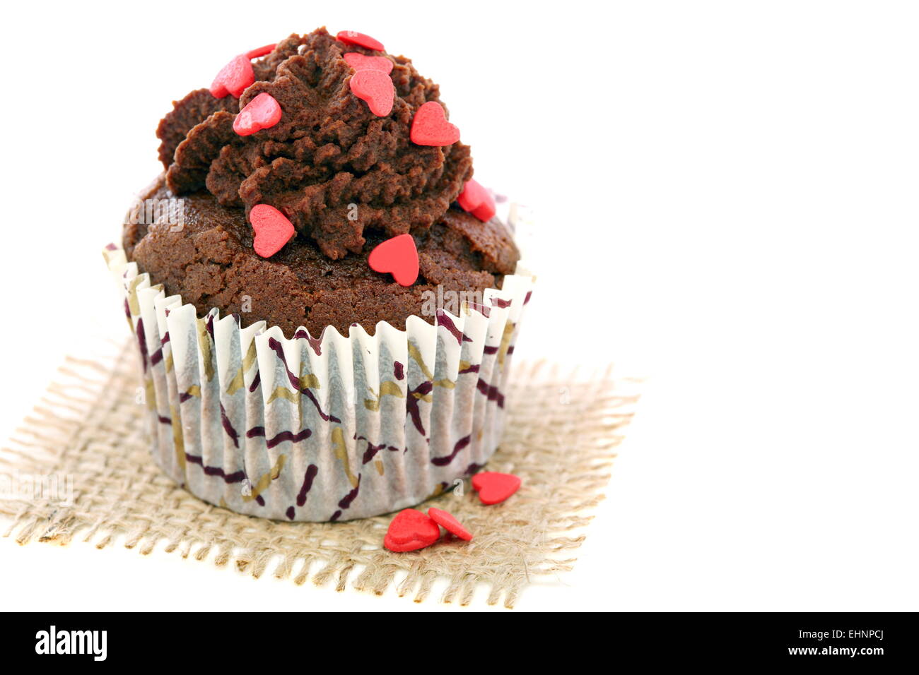 Cupcake mit Zuckerherzen. Stockfoto
