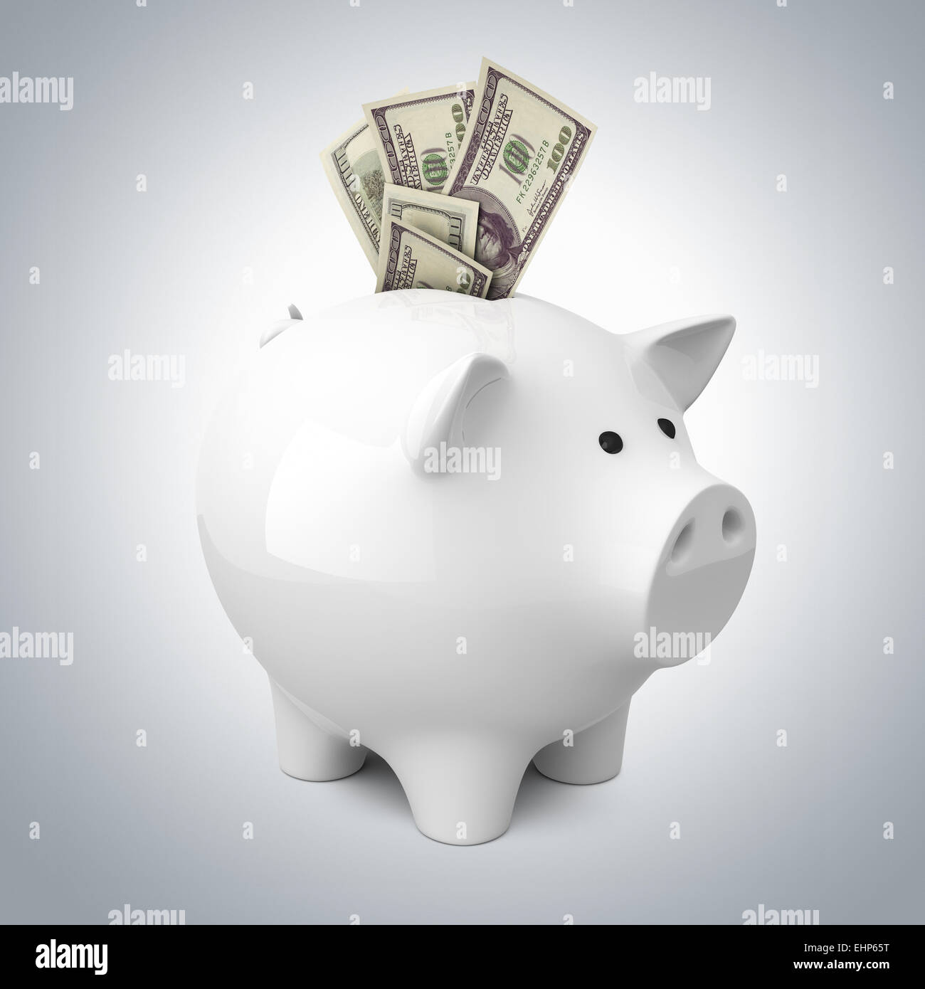 Sparschwein mit Dollar-Banknoten Stockfoto