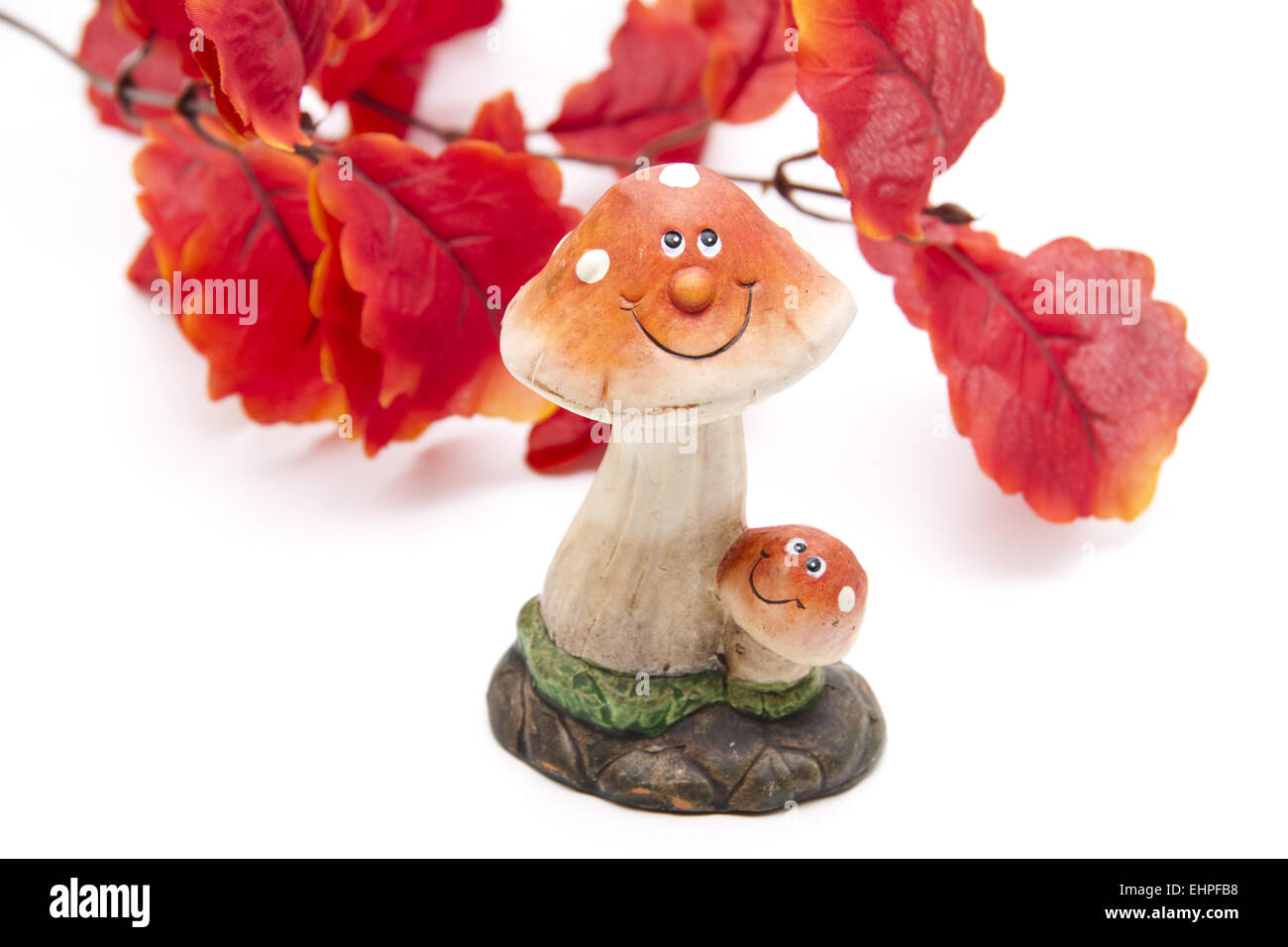 Pilz Figur mit Herbst branch Stockfoto