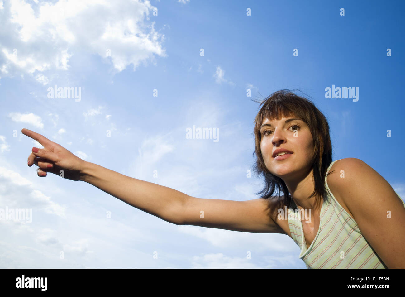junge Dame zu zeigen, Wolken Stockfoto