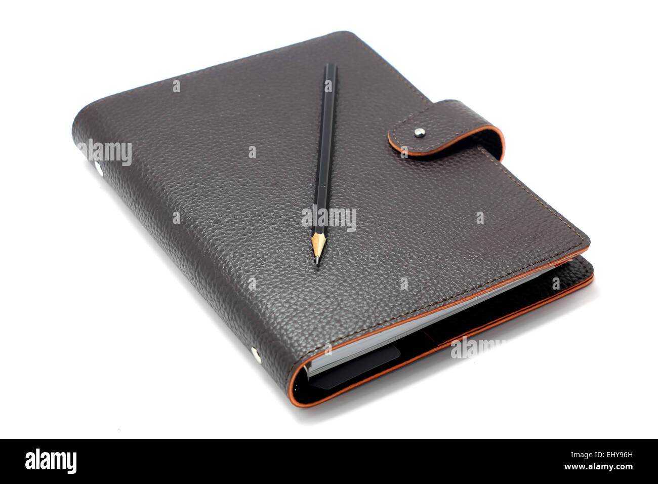 Notizbuch mit Bleistift isoliert auf weißem Hintergrund Stockfoto