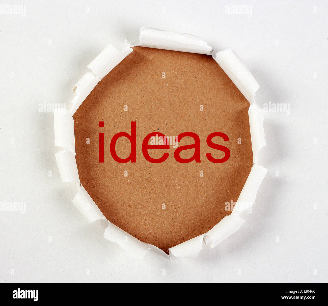 Brechen von Ideen Konzept mit Träne Papier auf braun. Stockfoto