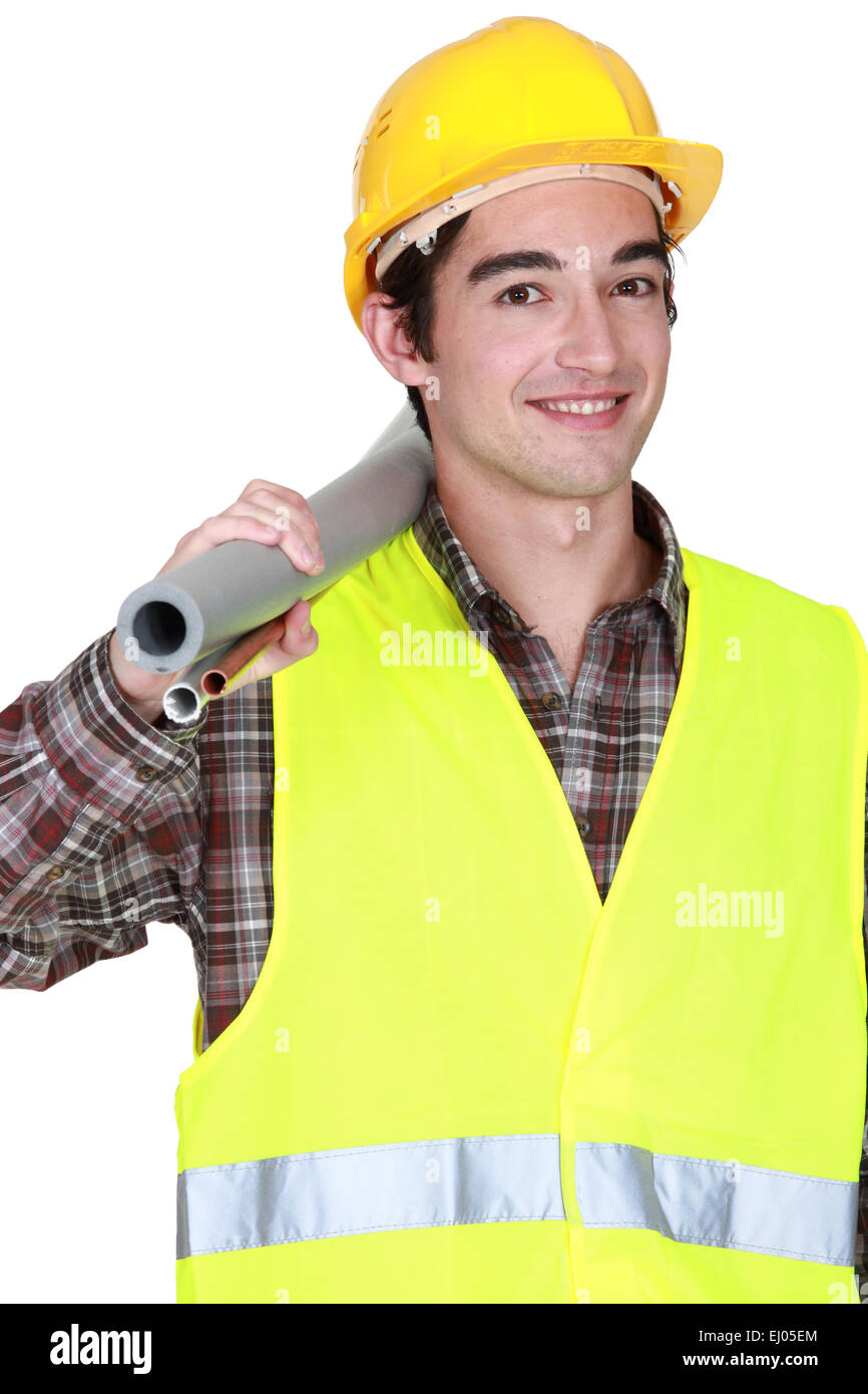 Bauarbeiter mit Röhren Stockfoto