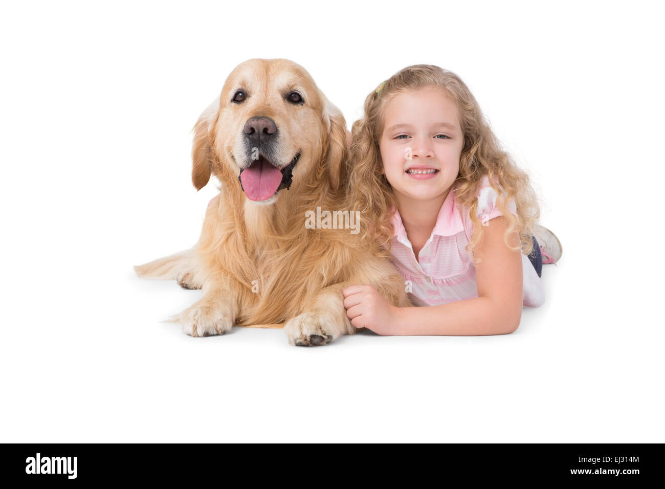 Mädchen und Hund auf dem Boden liegend Stockfoto