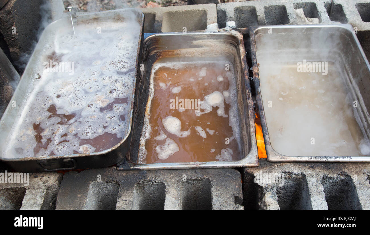 Detroit, Michigan - Sap aus Zucker-Ahornbäume wird über einem Holzfeuer, Ahorn Sirup gekocht. Stockfoto