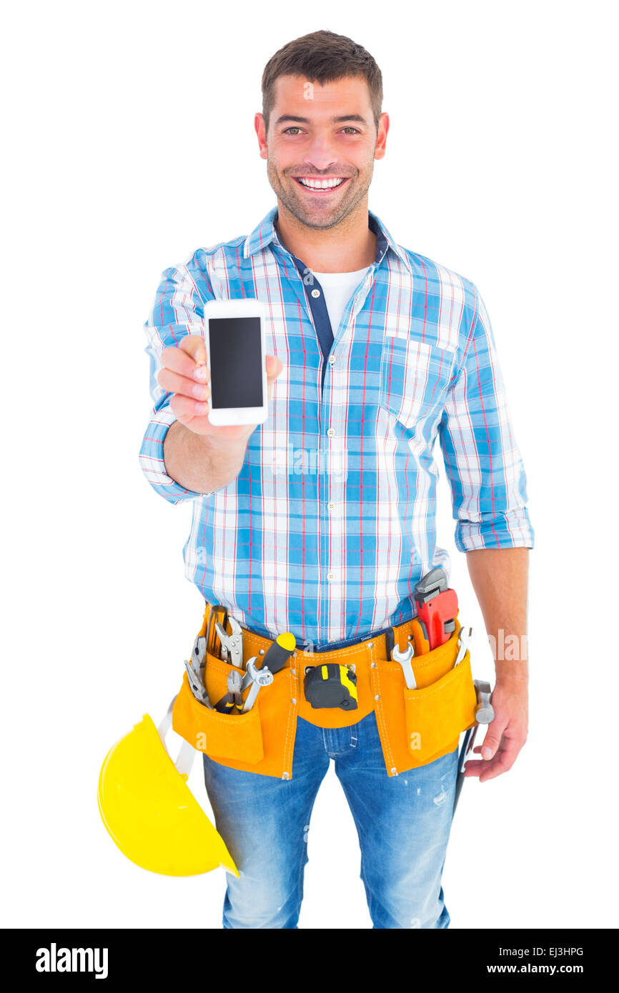 Porträt des Lächelns Handwerker zeigen Handy Stockfoto
