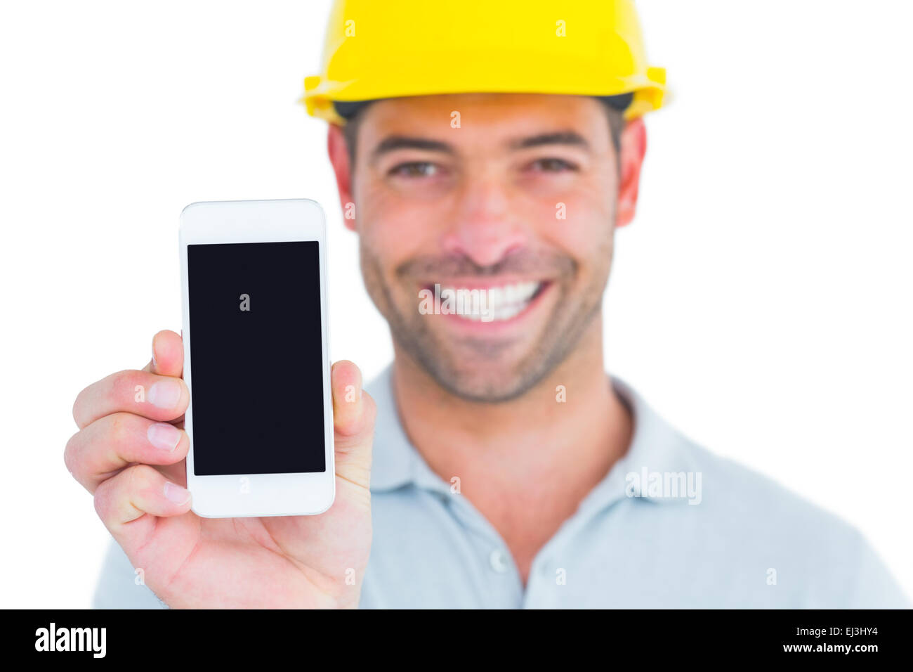 Porträt des Lächelns Handwerker zeigen Smartphone Stockfoto
