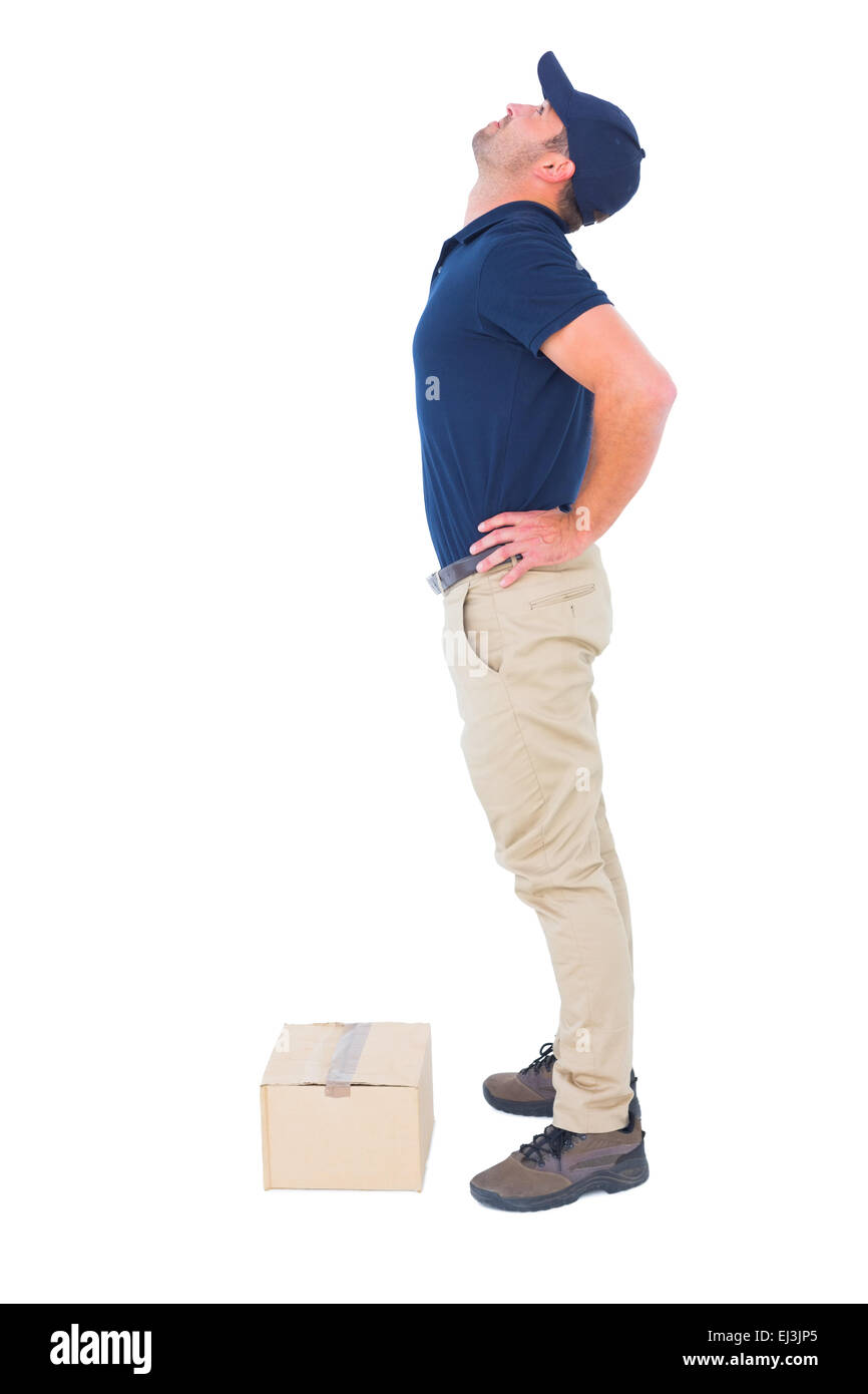 Lieferung Mann leidet unter Rückenschmerzen auf weißem Hintergrund Stockfoto