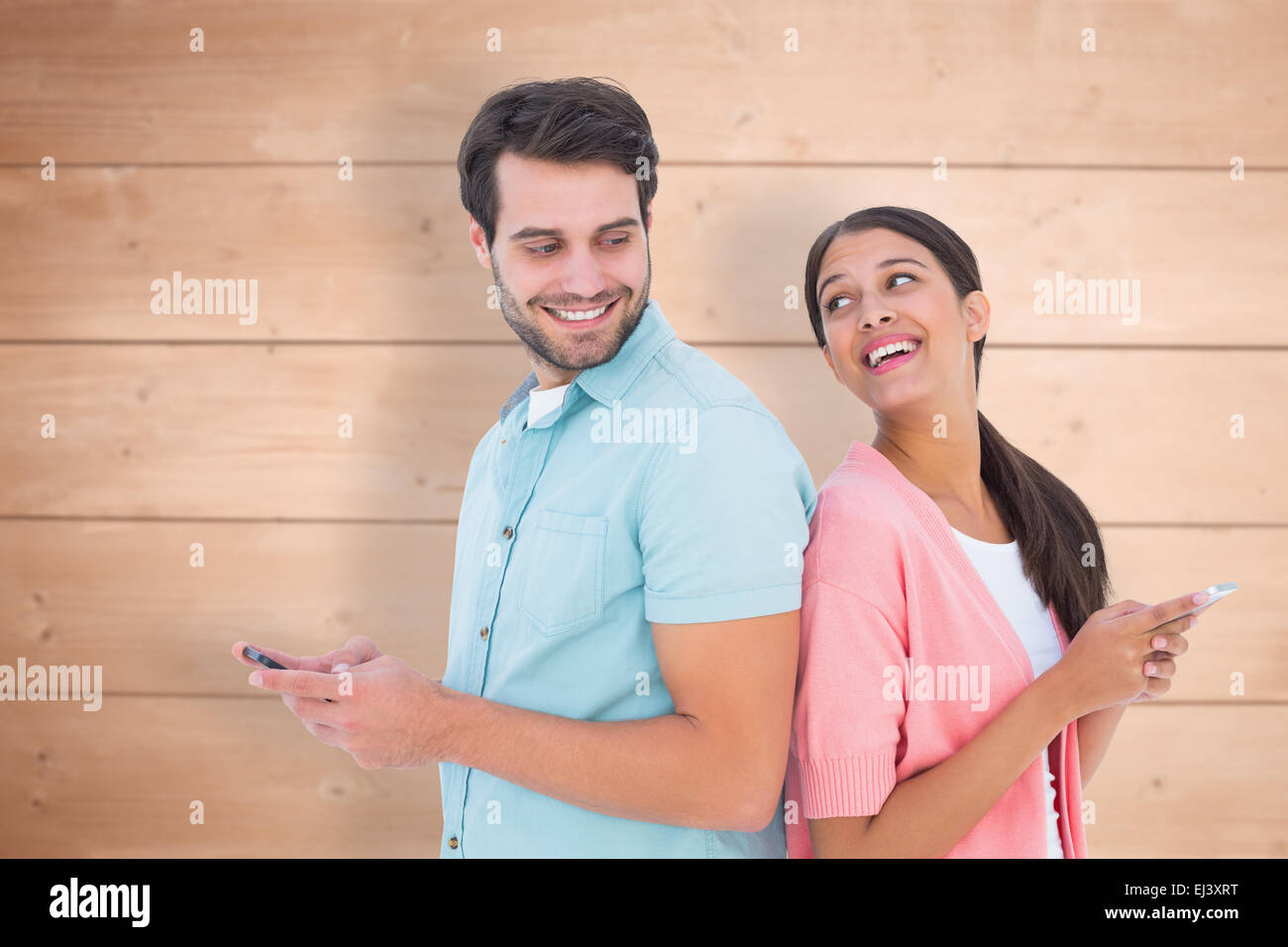 Zusammengesetztes Bild von glücklichen paar Kurzmitteilungen Stockfoto