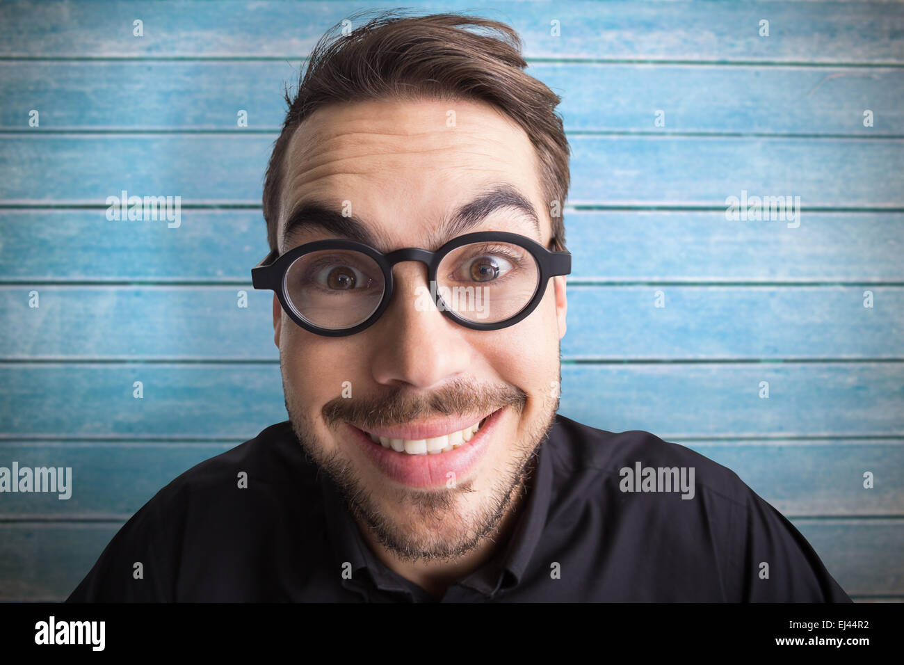 Zusammengesetztes Bild Porträt eines lächelnden Geschäftsmann mit Brille Stockfoto