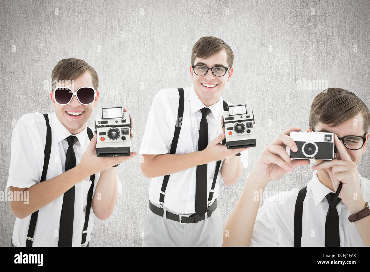 Zusammengesetztes Bild von Geek mit Kamera Stockfoto