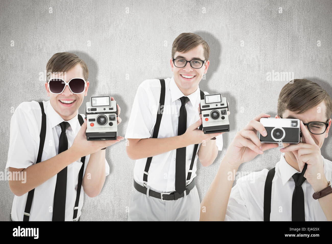 Zusammengesetztes Bild von Geek mit Kamera Stockfoto