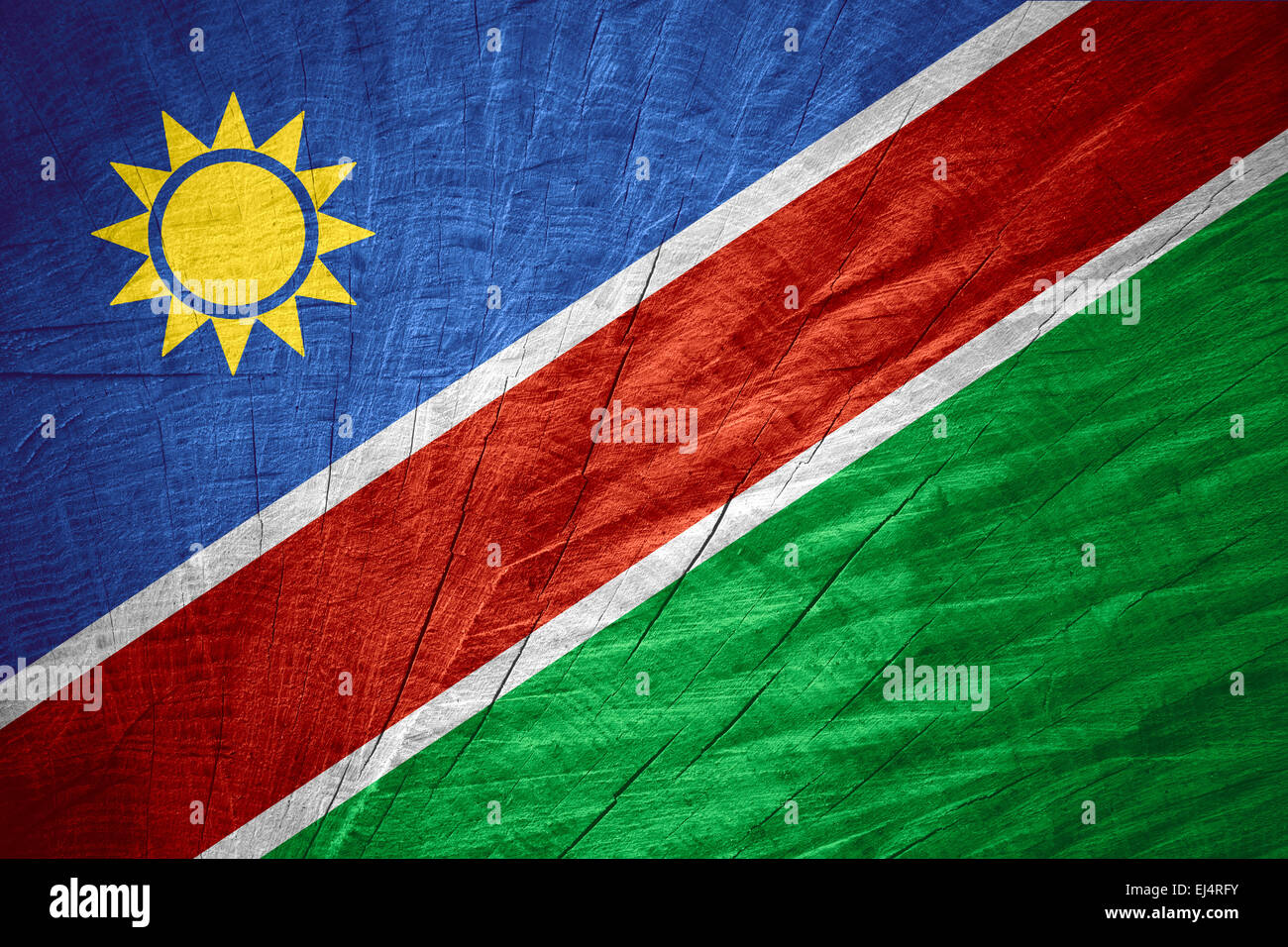 Namibia-Flagge oder namibischen Banner auf Holz Textur Stockfoto