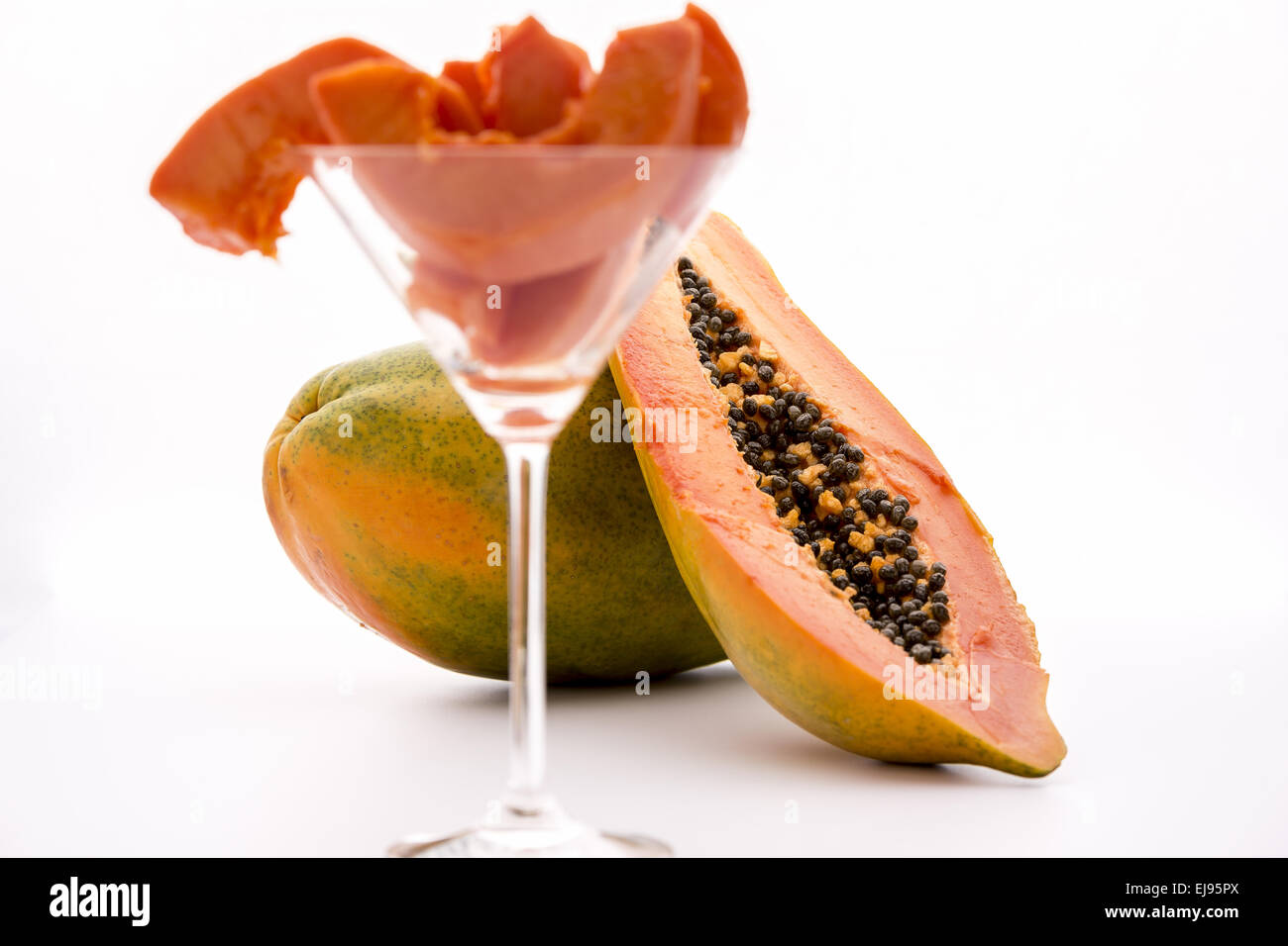 Kugelförmigen Körper und Mandarine Zellstoff - Papaya Stockfoto