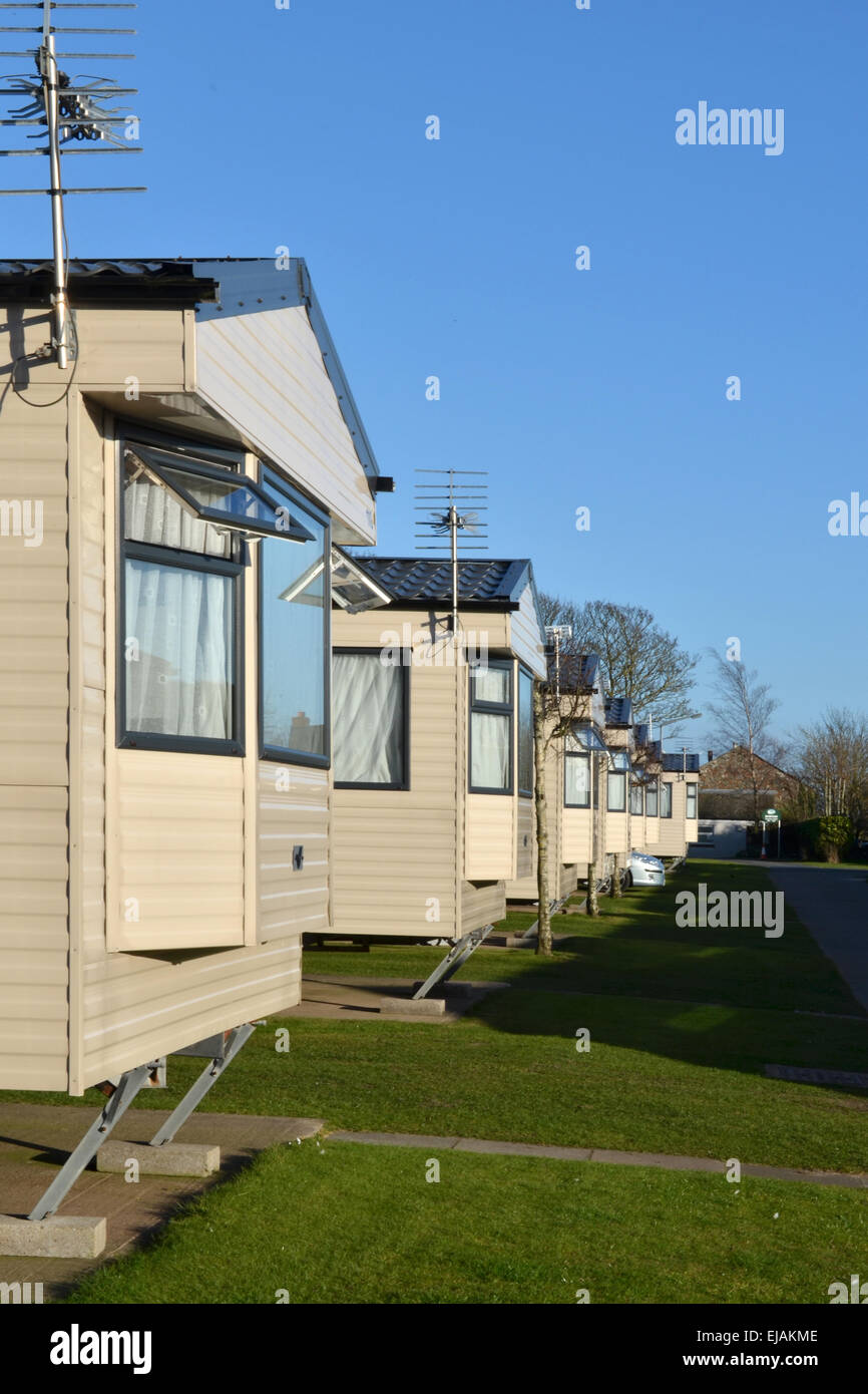 Eine Reihe von Wohnwagen in einem Caravan Park in Silloth, Cumbria, England Stockfoto