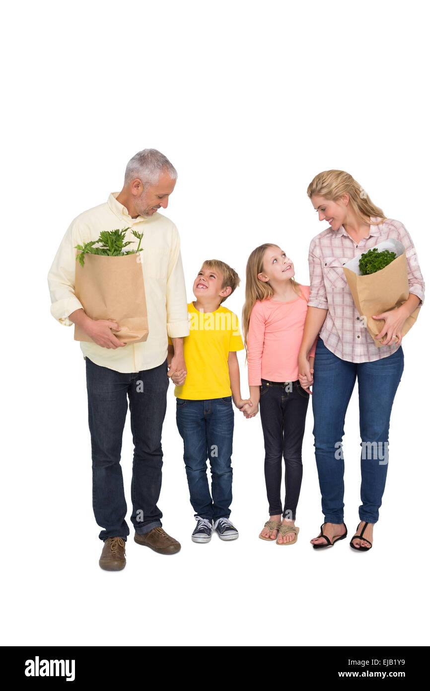 Glückliche Familie mit Einkaufstüten Stockfoto