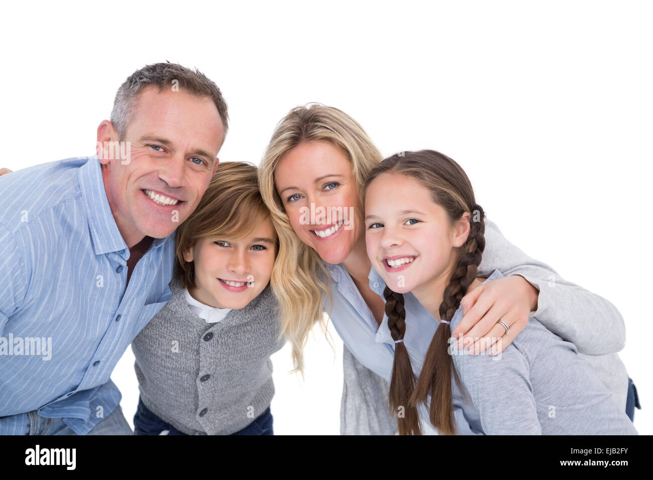 Glückliche Familie stehen und Lächeln in die Kamera Stockfoto
