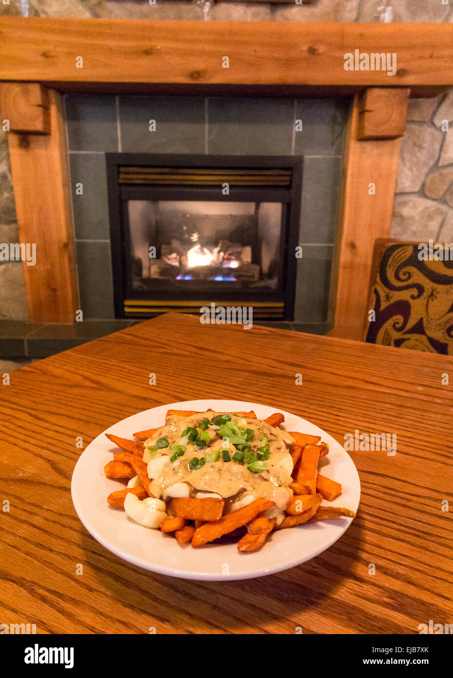 Die "Hummer-Yama," serviert eine Gourmet-Poutine Gericht im Sante Grille, ein Restaurant im Big White Ski resort Stockfoto